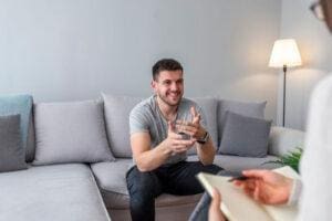 Person talking to their therapist about ADHD and impulse control