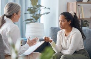 patient sitting on couch asks her therapist what is spravato used for